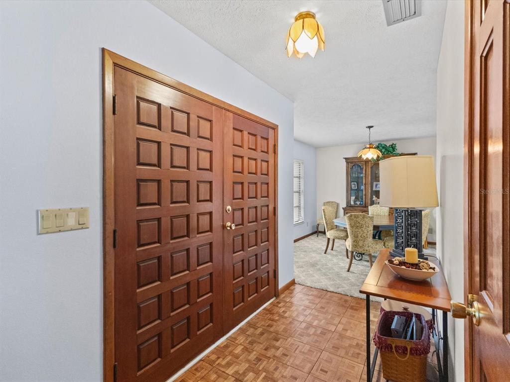 10700 Luscombe Court New Port Richey, FL 34654 - Photo 20 of 64 a view of hall way with furniture