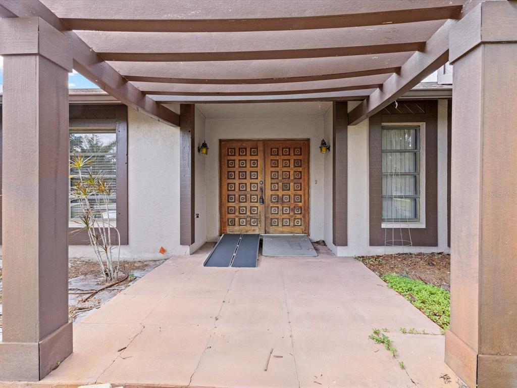 10700 Luscombe Court New Port Richey, FL 34654 - Photo 4 of 64 a view of entryway