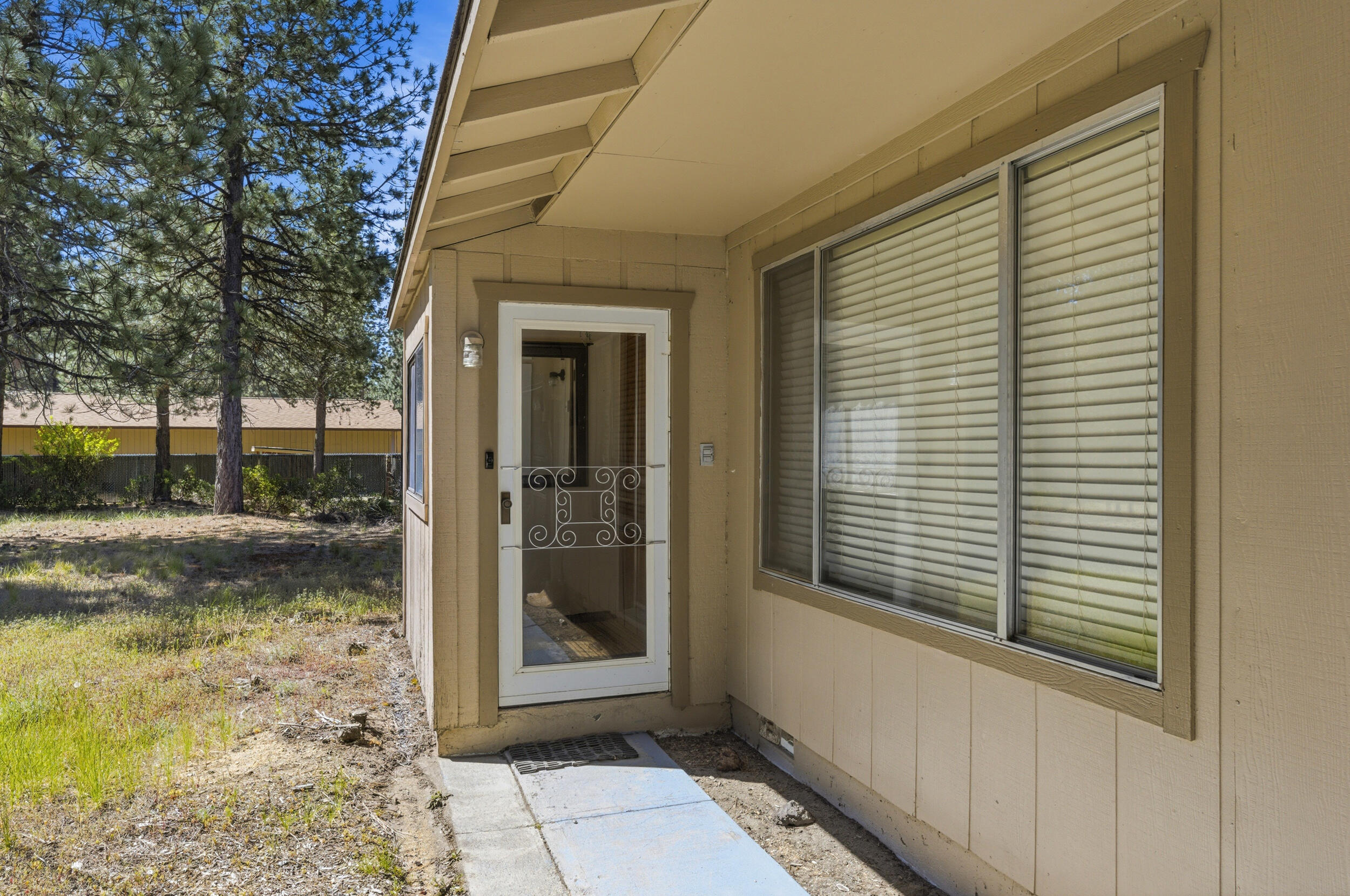 50868 Doe Loop La Pine, OR 97739 - Photo 5 of 51 a view of a door and a window