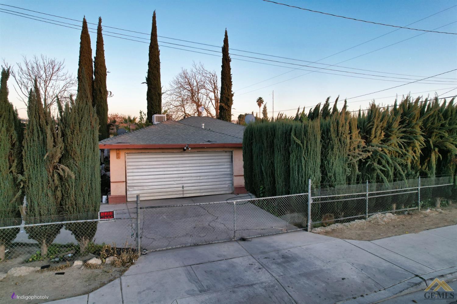 Undisclosed Address Richgrove, CA 93261 - Photo 16 of 21 a backyard of a house with table and chairs