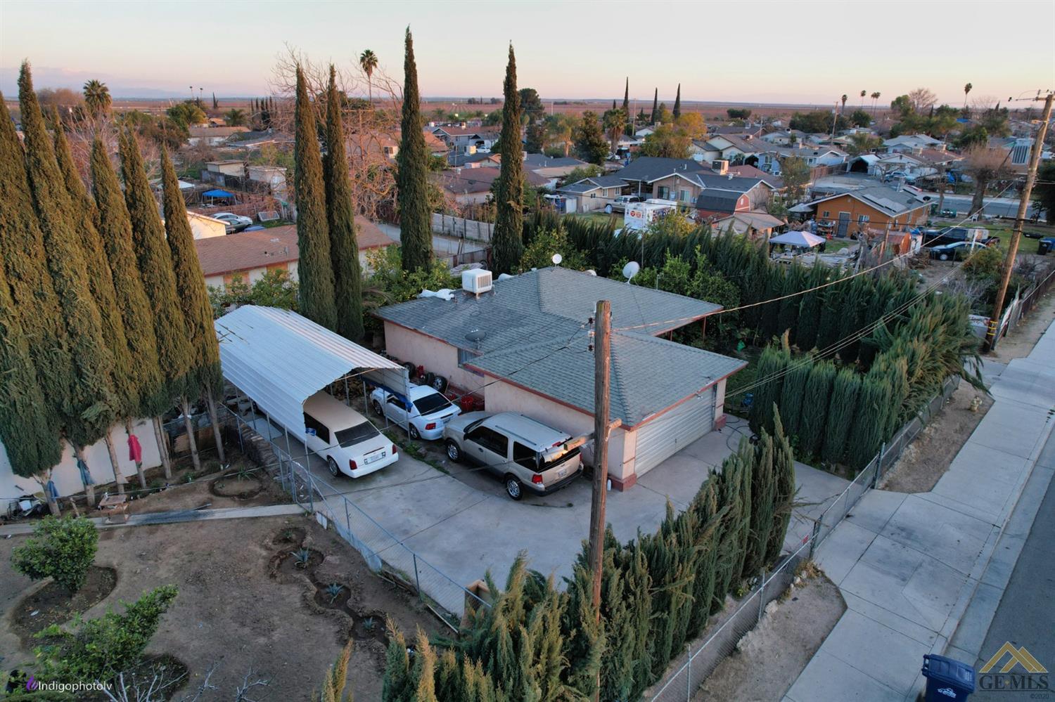 Undisclosed Address Richgrove, CA 93261 - Photo 18 of 21 an aerial view of a yard with table and chairs