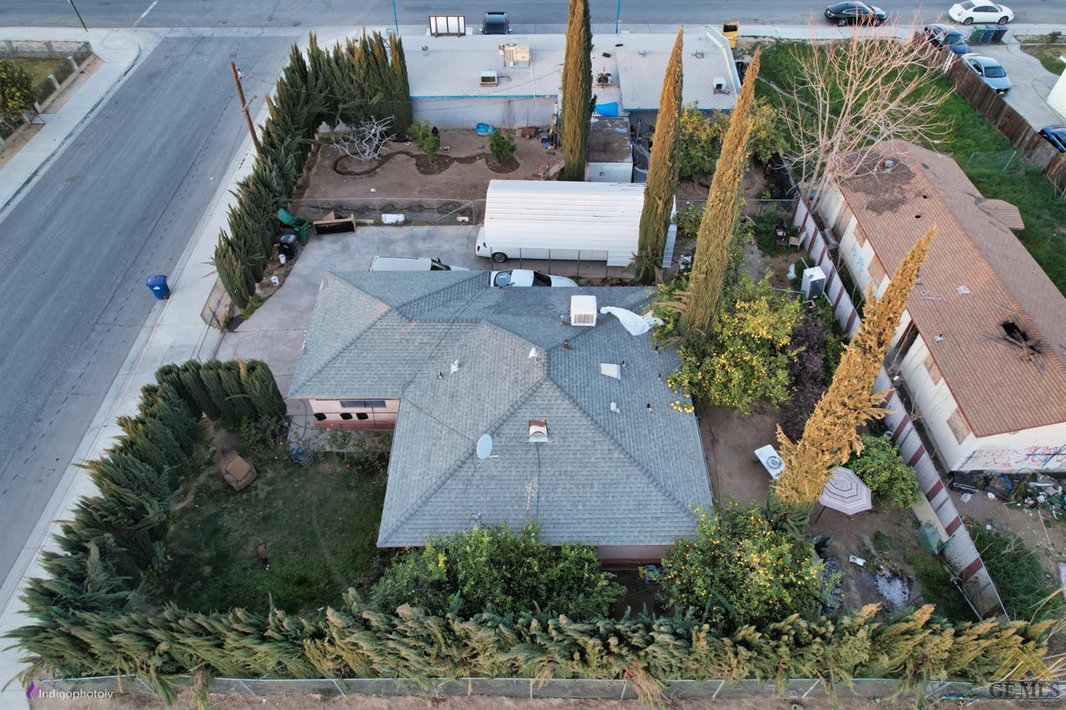 Undisclosed Address Richgrove, CA 93261 - Photo 21 of 21 an aerial view of a house with a yard