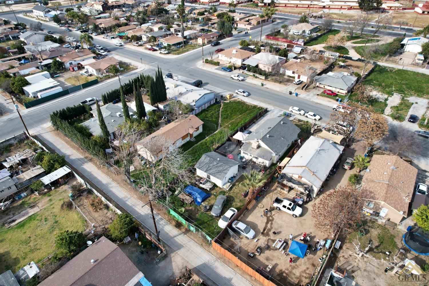 Undisclosed Address Richgrove, CA 93261 - Photo 7 of 21 an aerial view of a city with lots of residential buildings