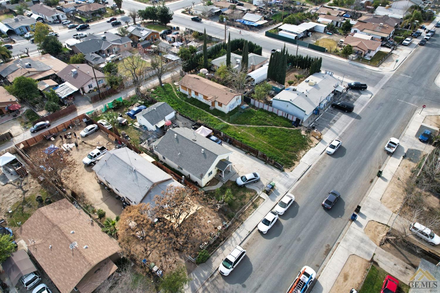 Undisclosed Address Richgrove, CA 93261 - Photo 8 of 21 an aerial view of a city with lots of residential buildings