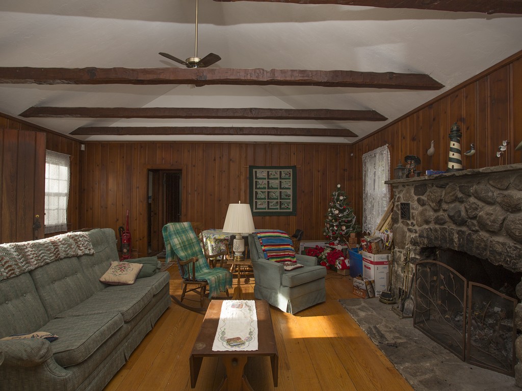 71 Tifft Road North Smithfield, RI 02896 - Photo 16 of 30 a living room with furniture and a fireplace