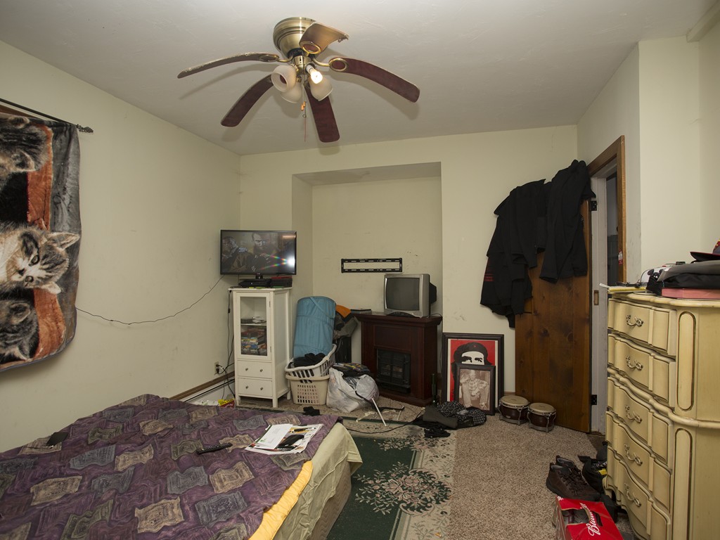71 Tifft Road North Smithfield, RI 02896 - Photo 18 of 30 a bedroom with a bed and cabinets