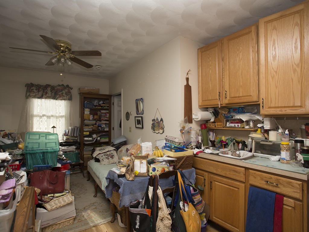 71 Tifft Road North Smithfield, RI 02896 - Photo 25 of 30 a kitchen with a table chairs stove and cabinets