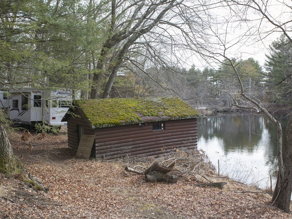 71 Tifft Road North Smithfield, RI 02896 - Photo 8 of 30 a view of a bench in a yard