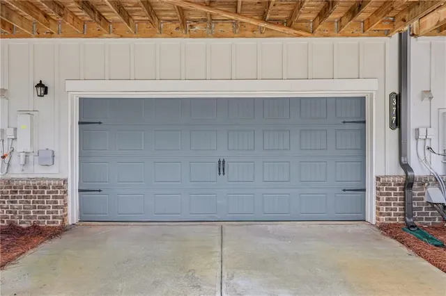 a front view of a house with a garage