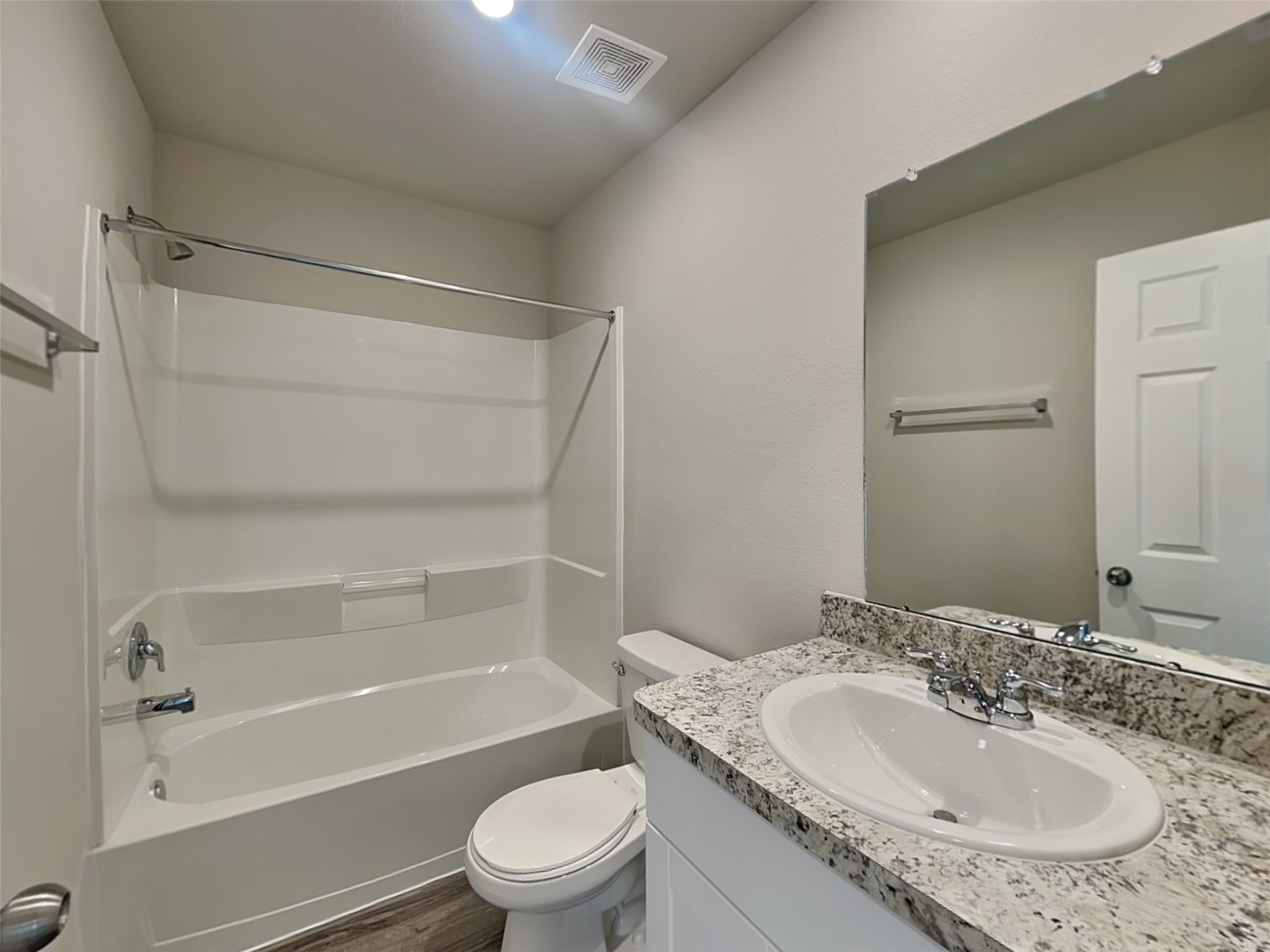 1907 Evening Breeze Lane Houston, TX 77073 - Photo 14 of 16 a bathroom with a granite countertop sink toilet and shower