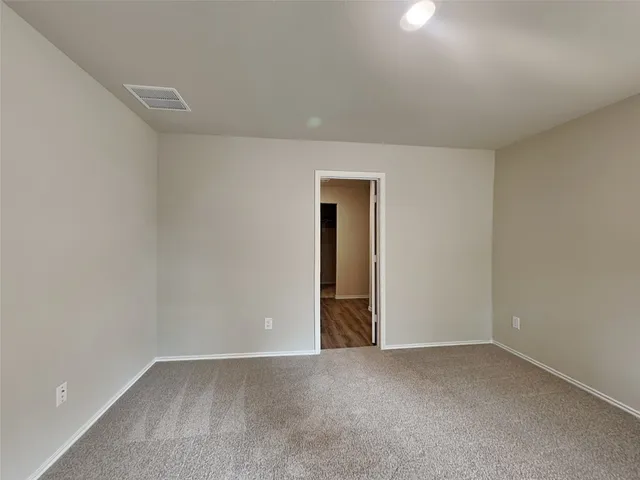 an empty room with an entryway