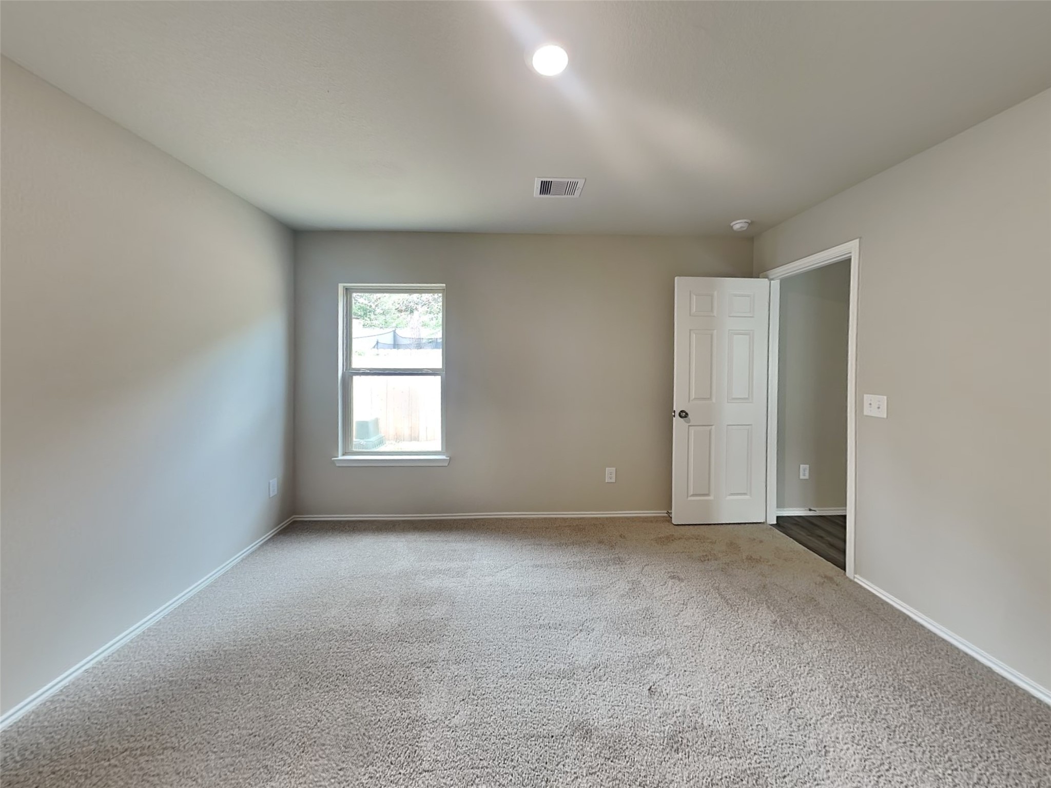 1907 Evening Breeze Lane Houston, TX 77073 - Photo 8 of 16 a view of an empty room with a window