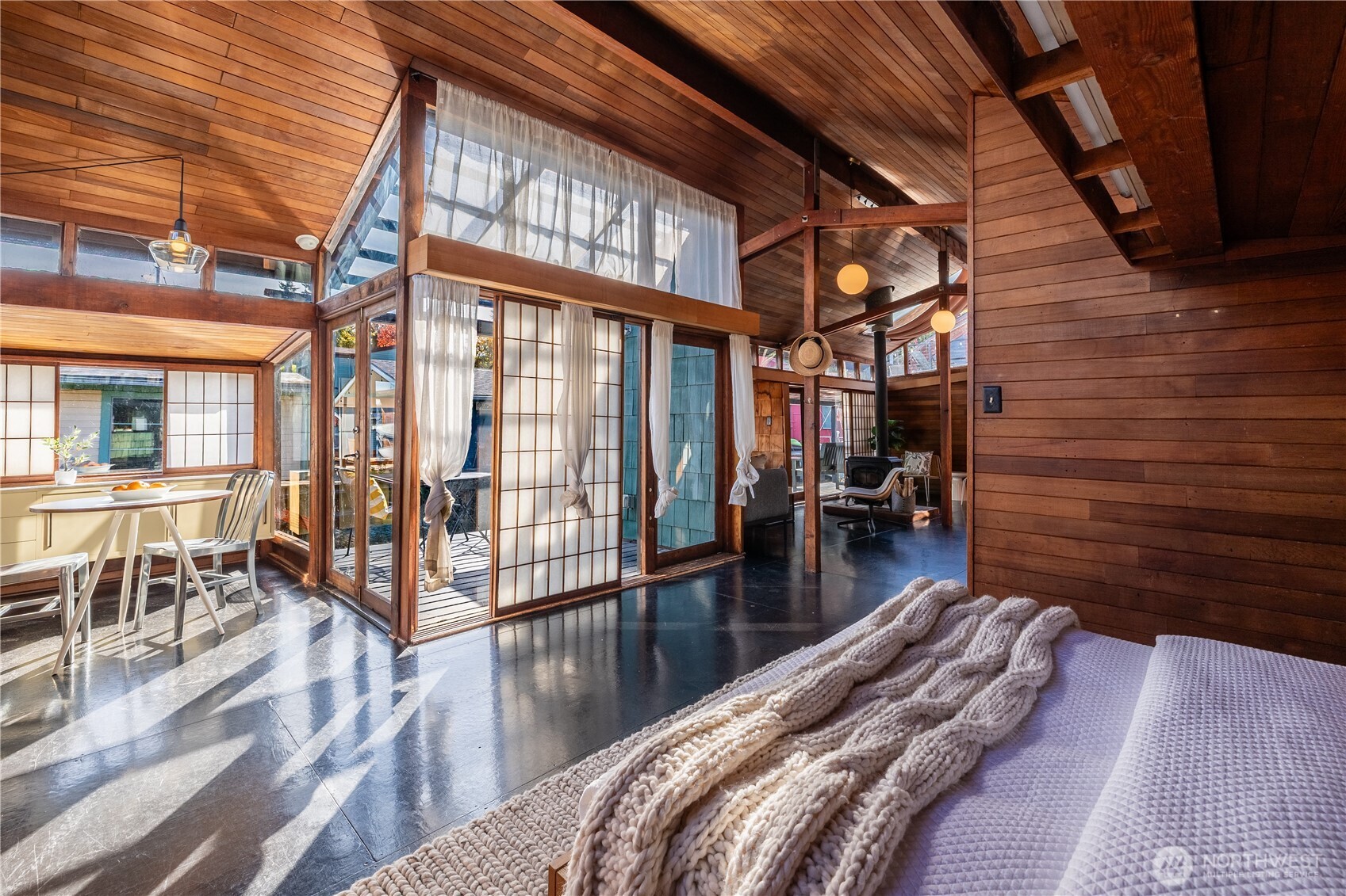 3130 Portage Bay Place East, Unit C Seattle, WA 98102 - Photo 19 of 40 a bed room with a bed and a table