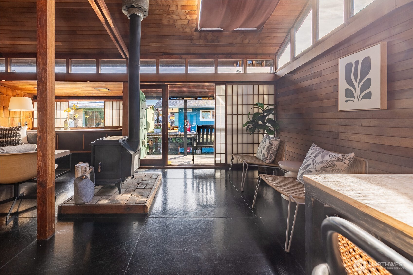3130 Portage Bay Place East, Unit C Seattle, WA 98102 - Photo 5 of 40 a living room with furniture and a table