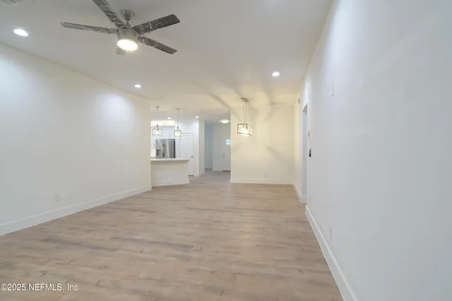 a bathroom with a glass door and shower