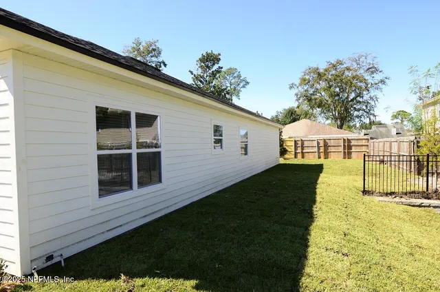 a view of backyard of house