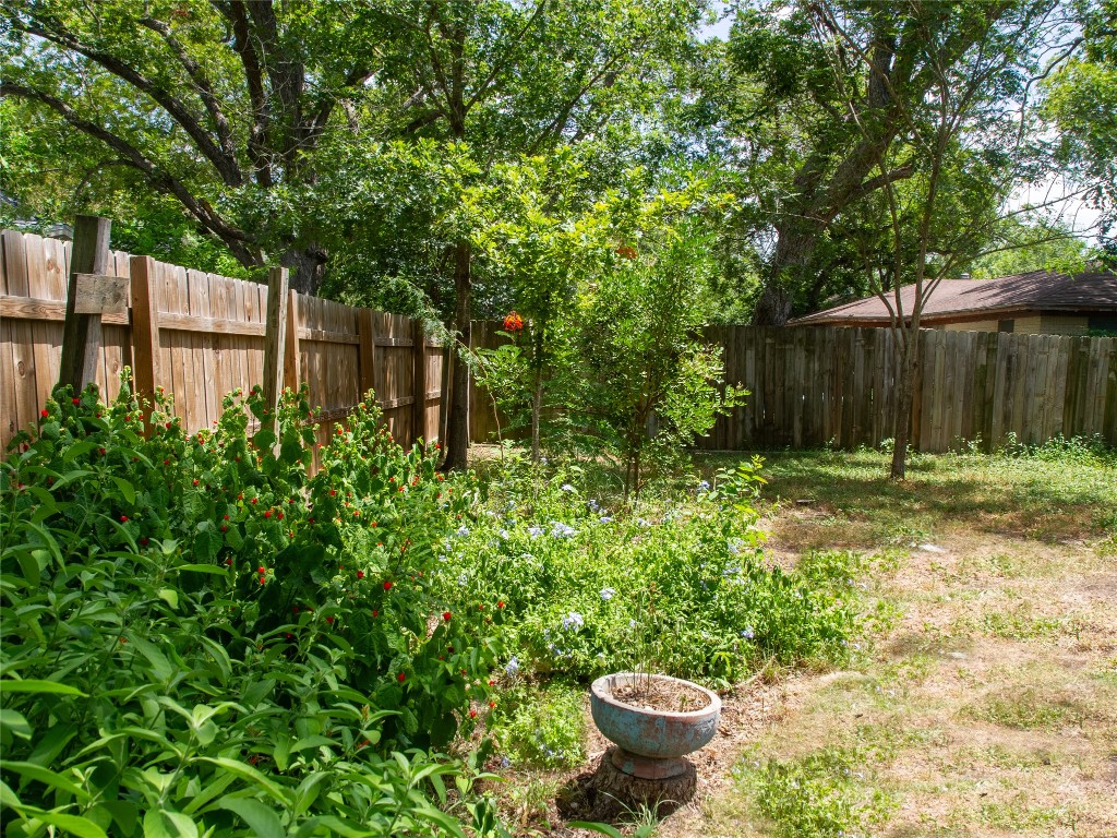 406 Concho Street, Unit B Lockhart, TX 78644 - Photo 16 of 21 a view of a backyard of the house