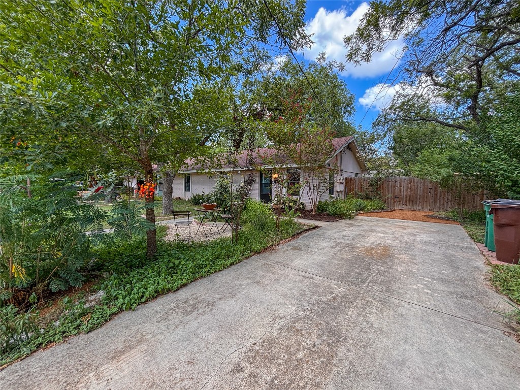 406 Concho Street, Unit B Lockhart, TX 78644 - Photo 21 of 21 a view of a house with a yard and tree s