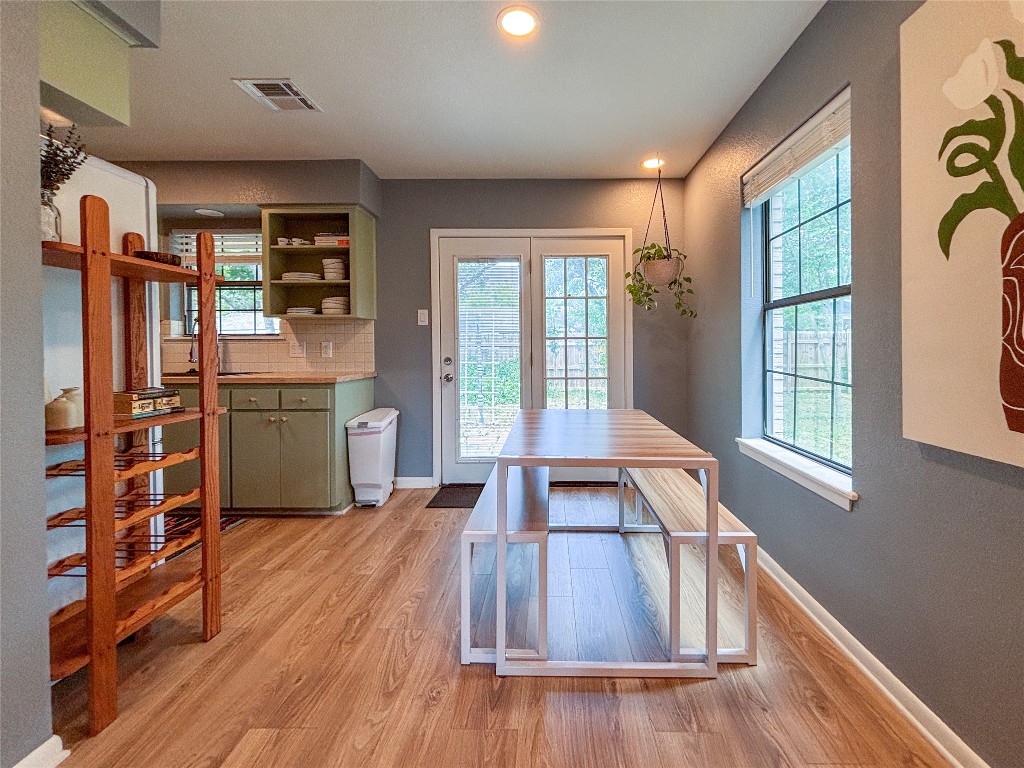 406 Concho Street, Unit B Lockhart, TX 78644 - Photo 7 of 21 a living room with furniture window and wooden floor