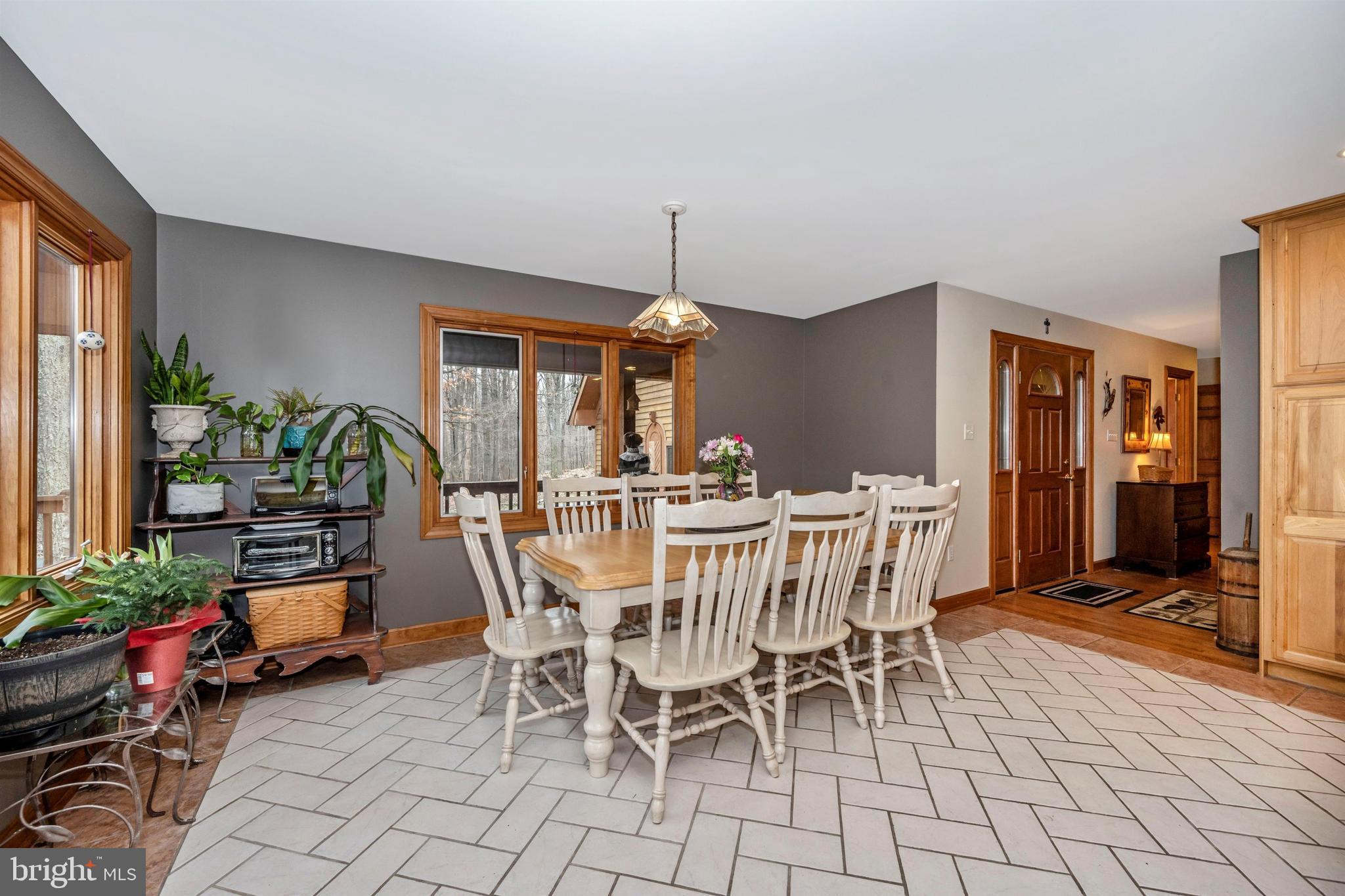 5130 Shookstown Road Frederick, MD 21702 - Photo 21 of 87 a dining room with furniture window and wooden floor