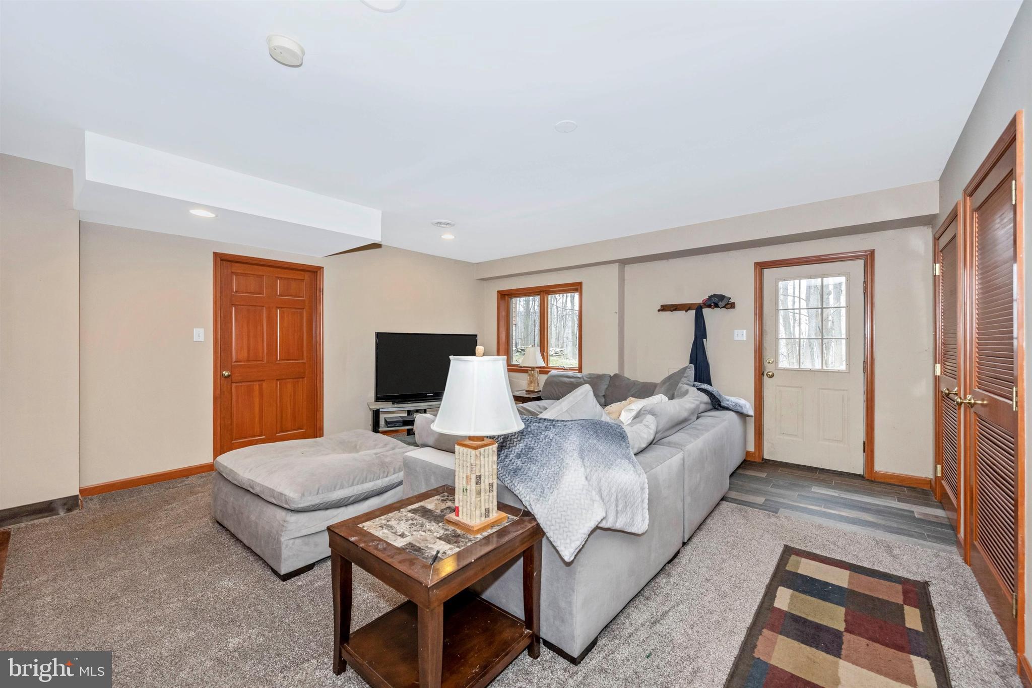 5130 Shookstown Road Frederick, MD 21702 - Photo 32 of 87 a living room with furniture and a rug