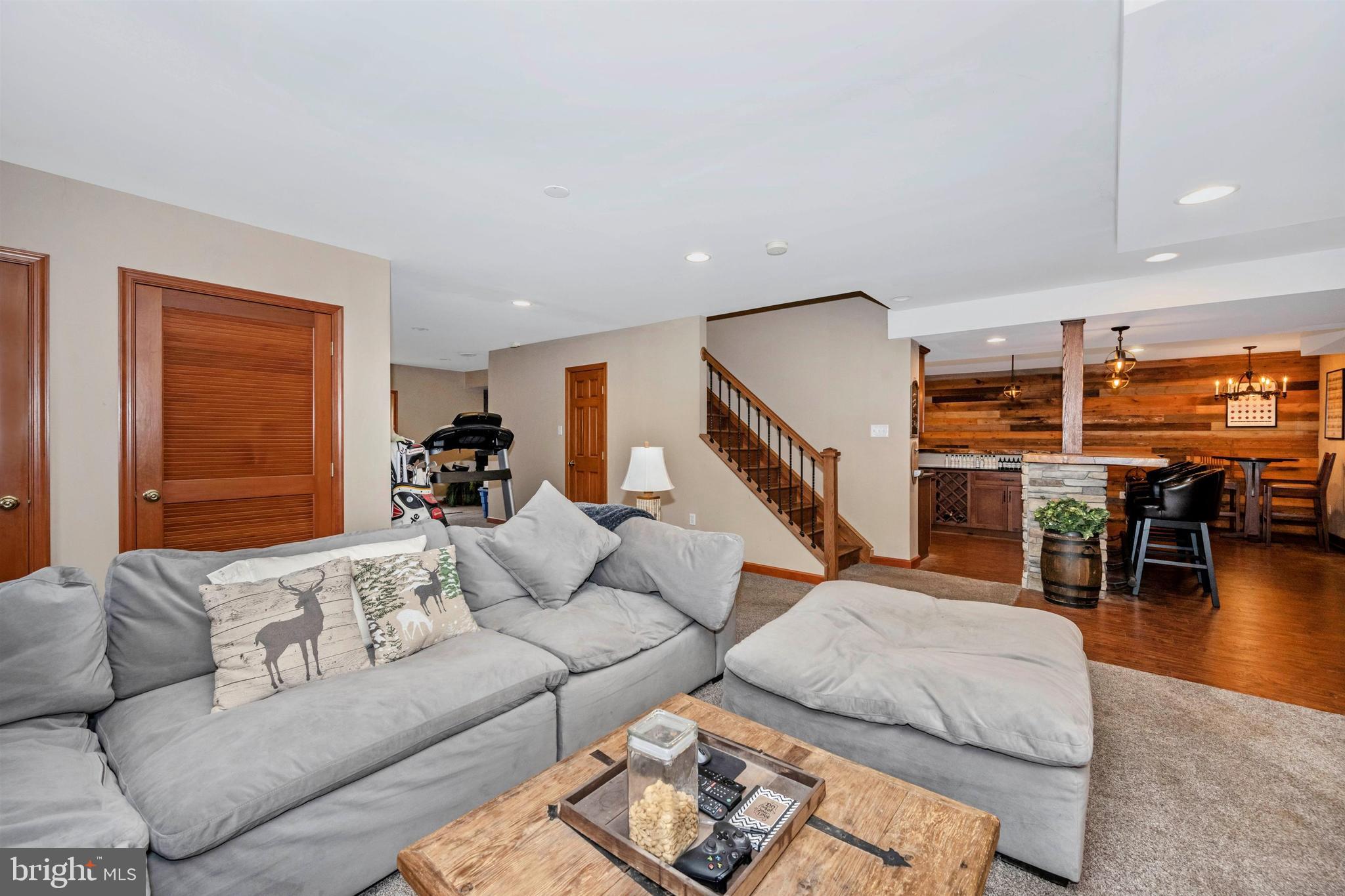 5130 Shookstown Road Frederick, MD 21702 - Photo 34 of 87 a living room with furniture and wooden floor
