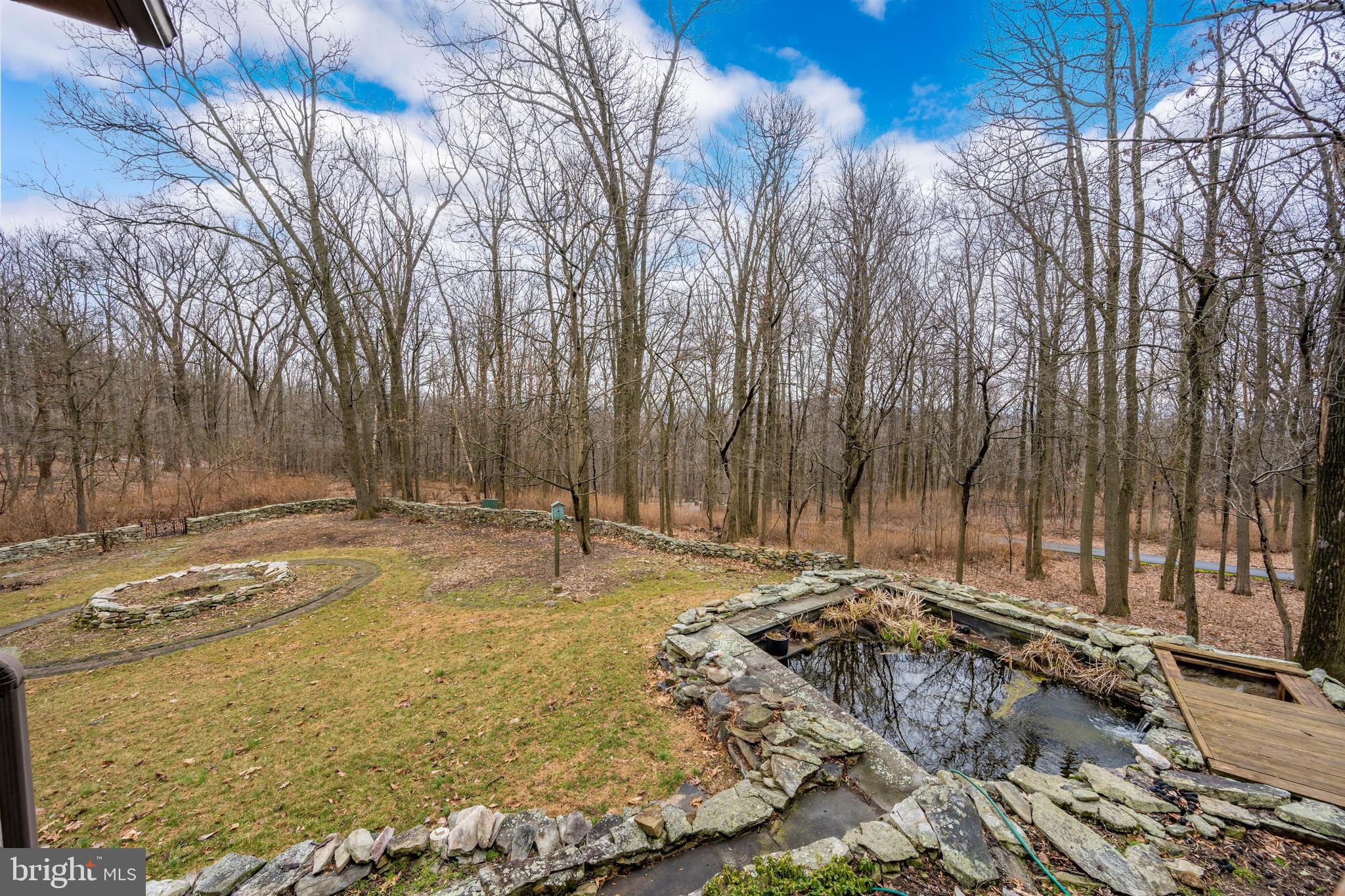 5130 Shookstown Road Frederick, MD 21702 - Photo 49 of 87 a view of a backyard with large trees