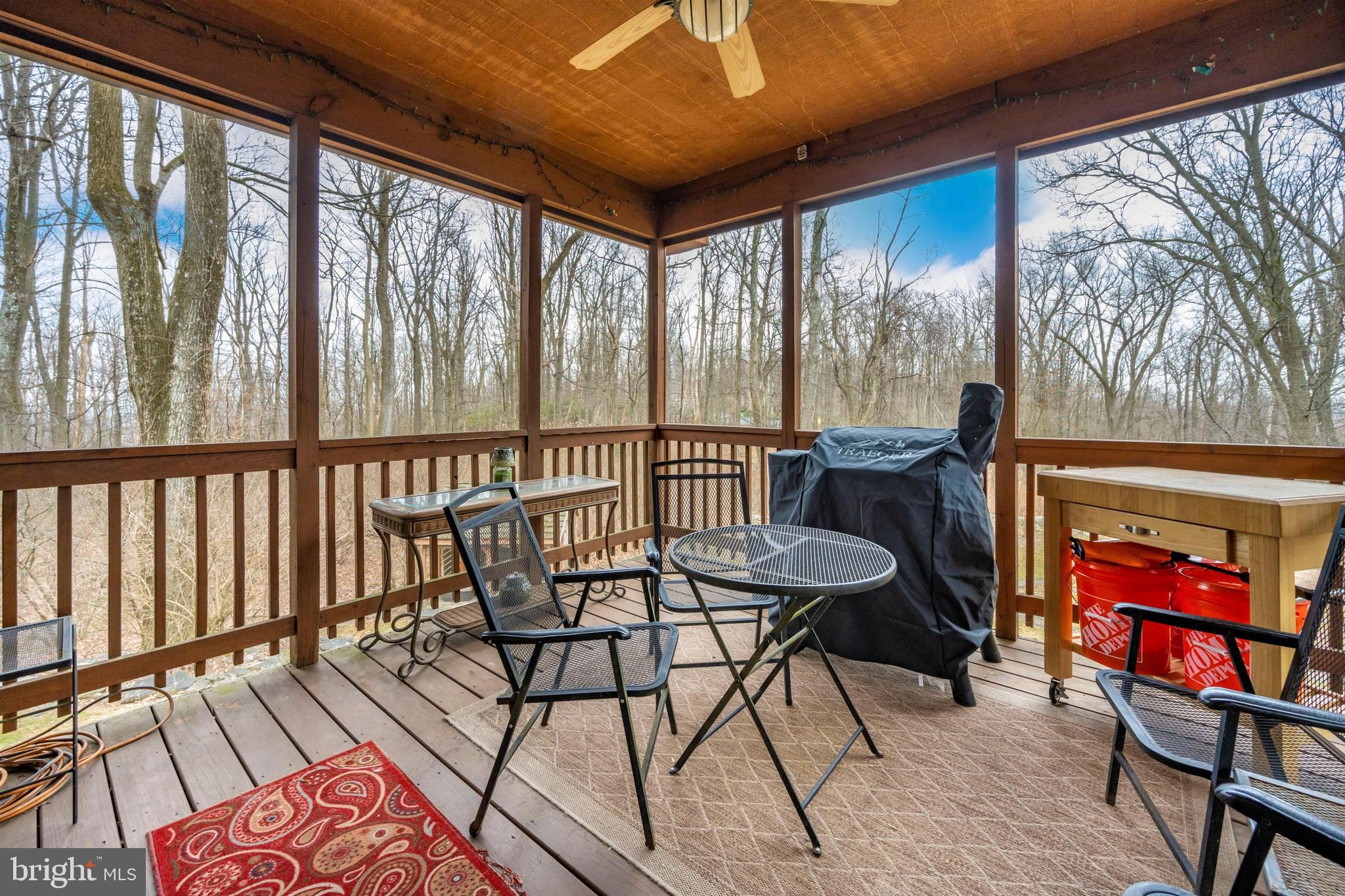 5130 Shookstown Road Frederick, MD 21702 - Photo 50 of 87 a view of a porch with furniture and hardwood floor