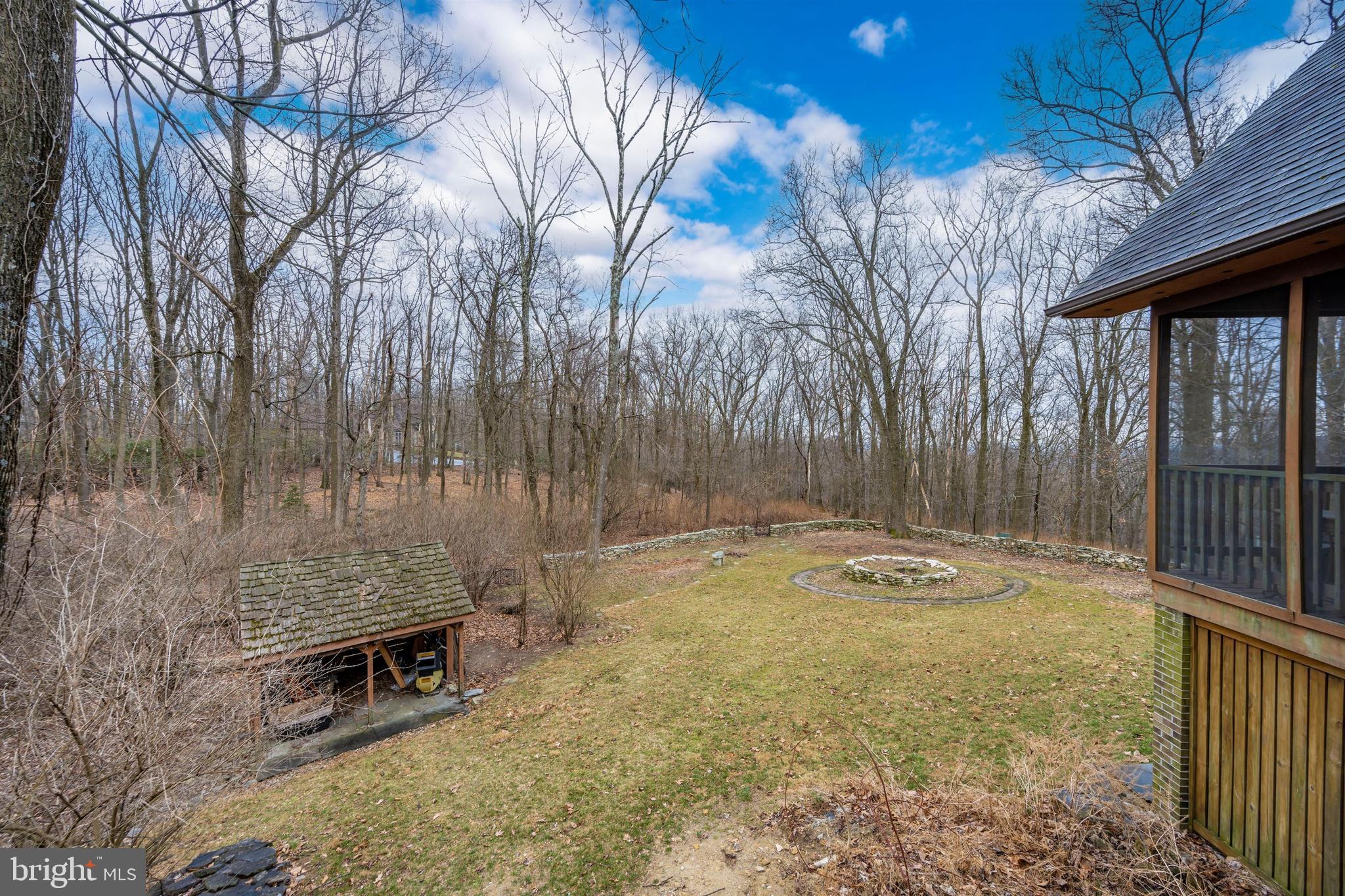 5130 Shookstown Road Frederick, MD 21702 - Photo 52 of 87 a view of a backyard with large trees