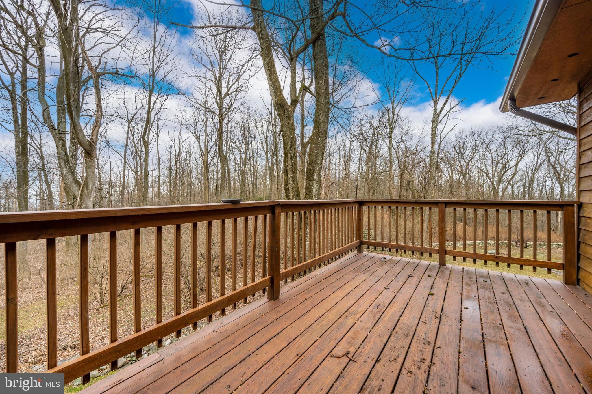 5130 Shookstown Road Frederick, MD 21702 - Photo 54 of 87 a balcony with wooden floor and fence