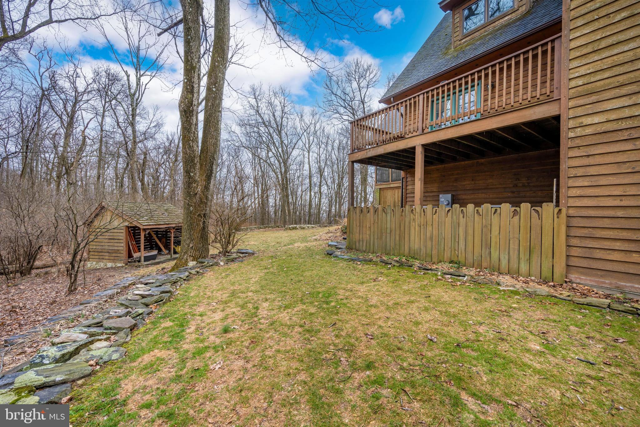 5130 Shookstown Road Frederick, MD 21702 - Photo 64 of 87 a view of a house with a wooden fence