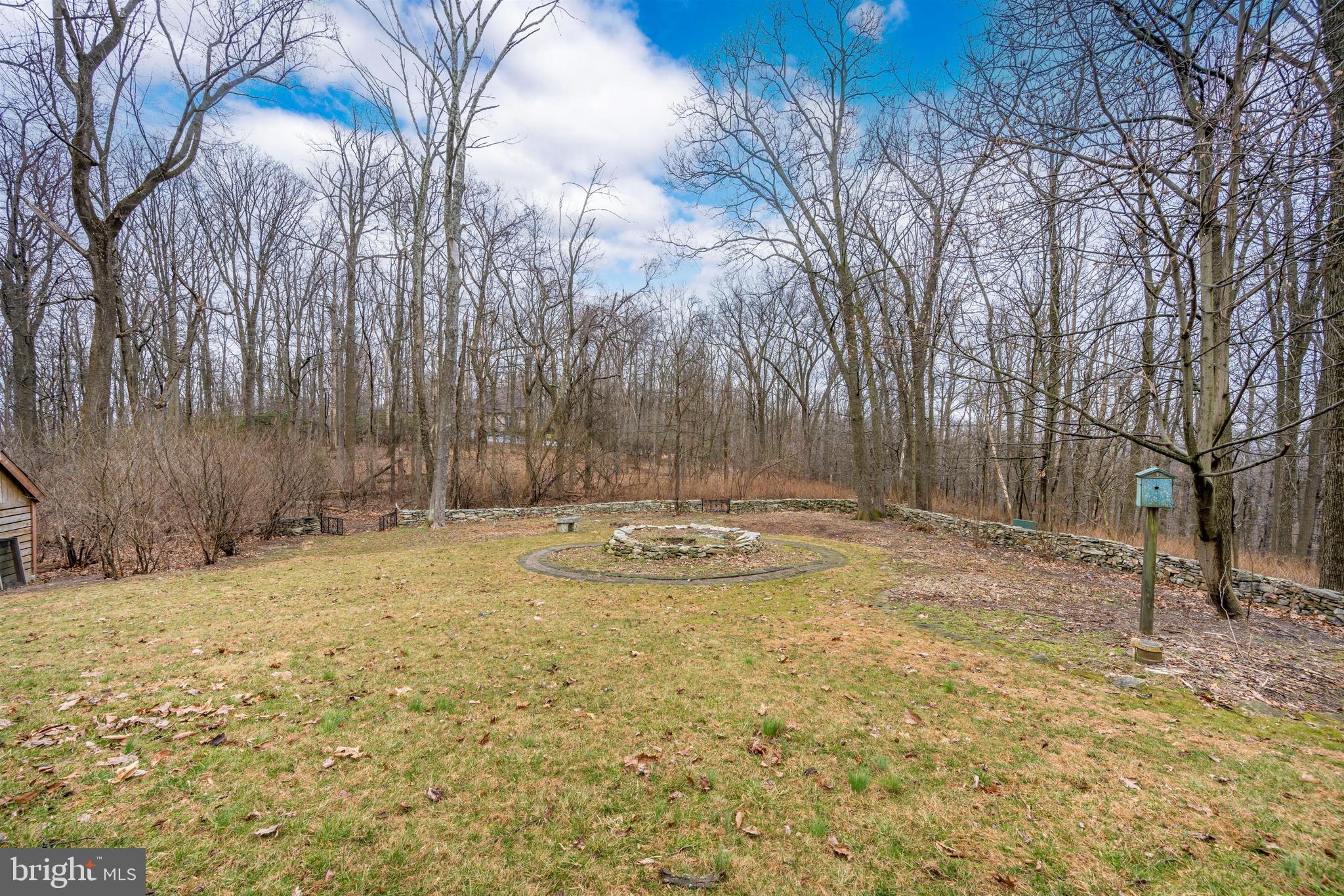 5130 Shookstown Road Frederick, MD 21702 - Photo 81 of 87 a view of a backyard with large trees