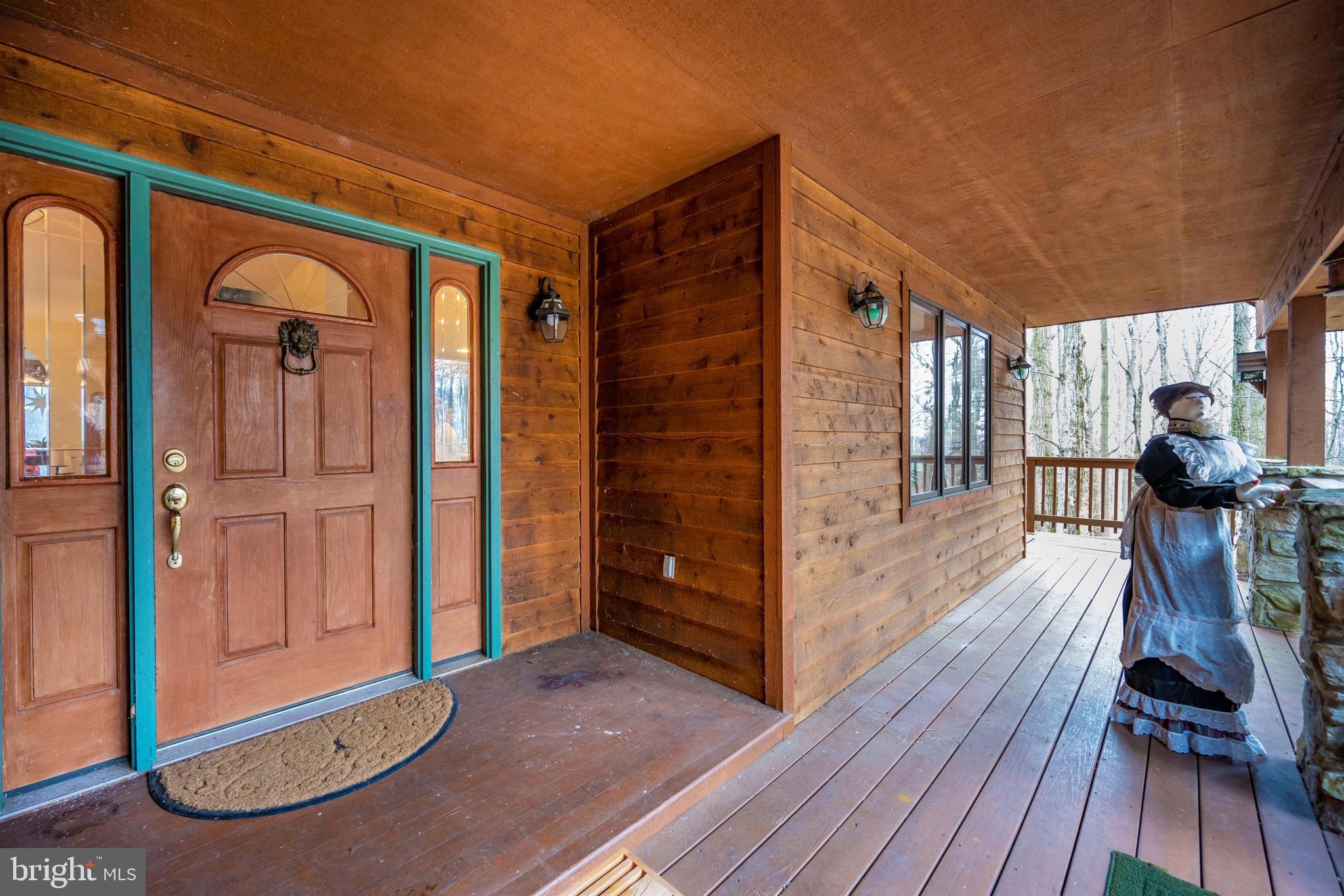5130 Shookstown Road Frederick, MD 21702 - Photo 86 of 87 a view of a hallway with wooden floor and staircase