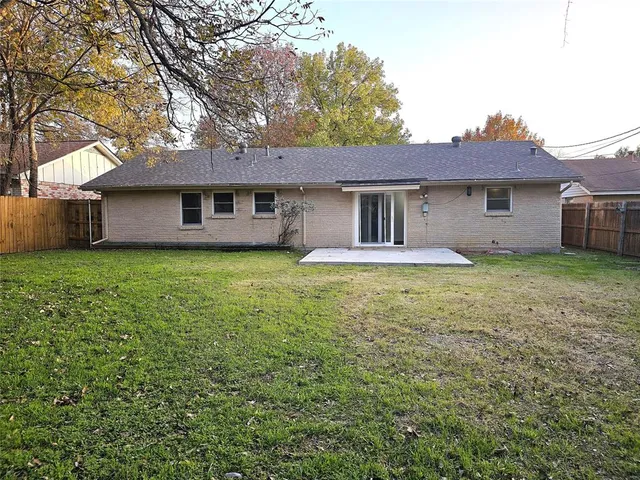 a house view with a garden space