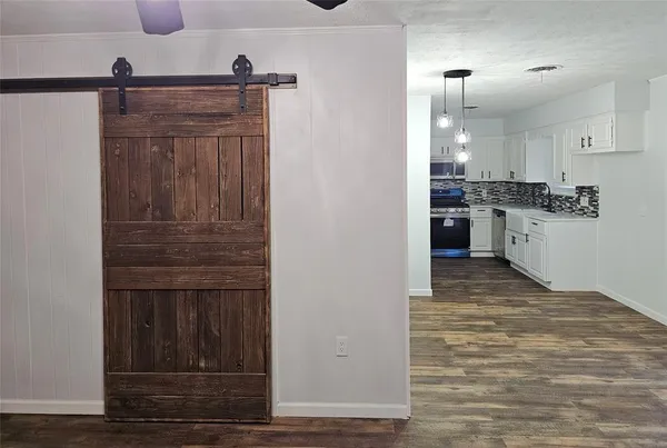 a view of a kitchen with a sink