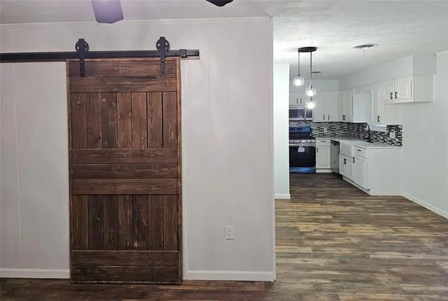 a view of a kitchen with a sink
