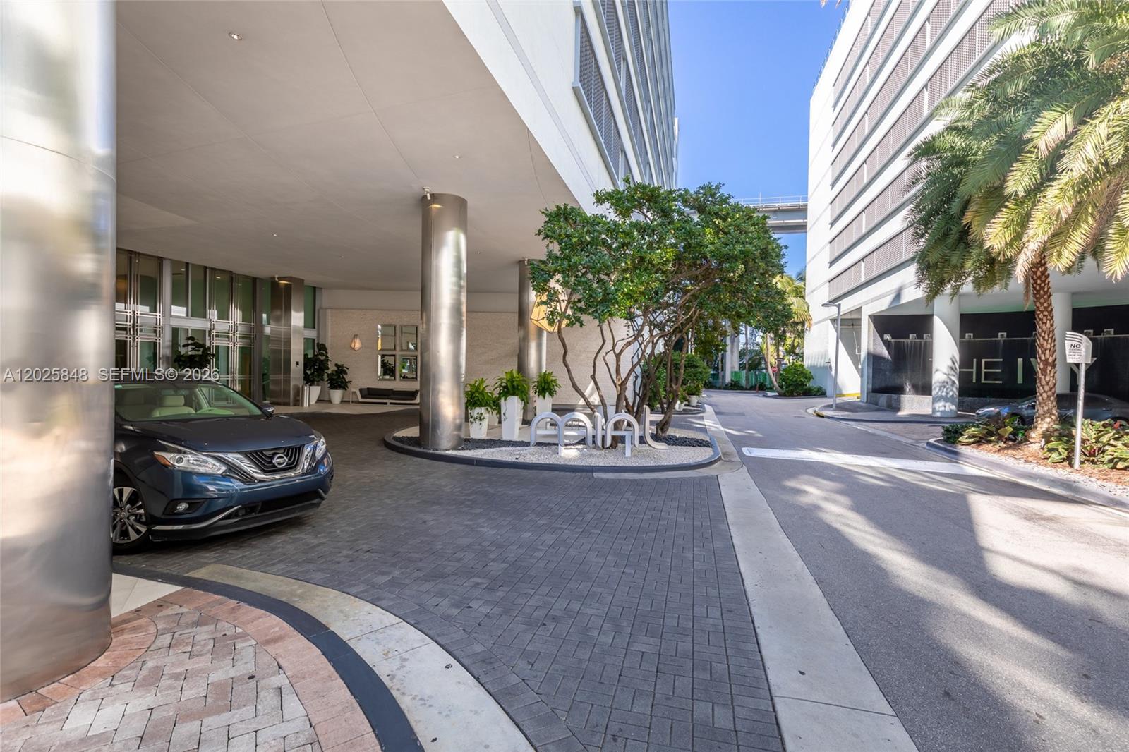 92 Southwest 3rd Street, Unit 5108 Miami, FL 33130 - Photo 27 of 33 a view of a cars park in front of a building