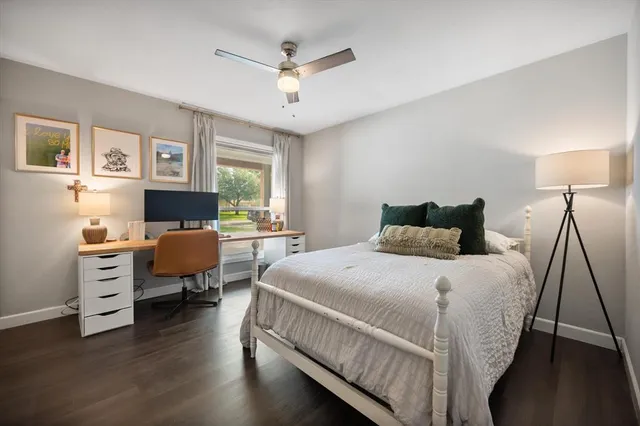 a bedroom with bed room and window