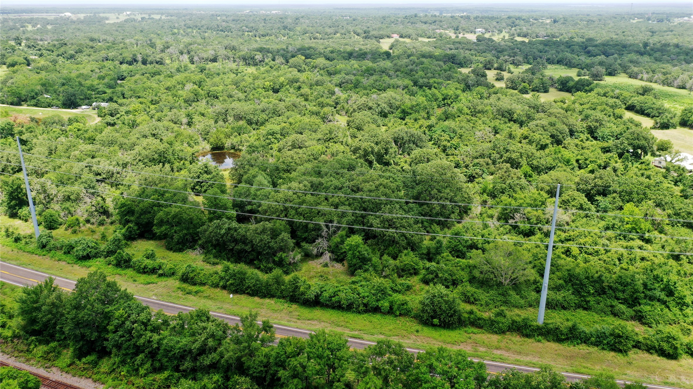 Tbd Tbd Fm-2154 Navasota, TX 77868 - Photo 24 of 27 an aerial view of residential houses with outdoor space and trees