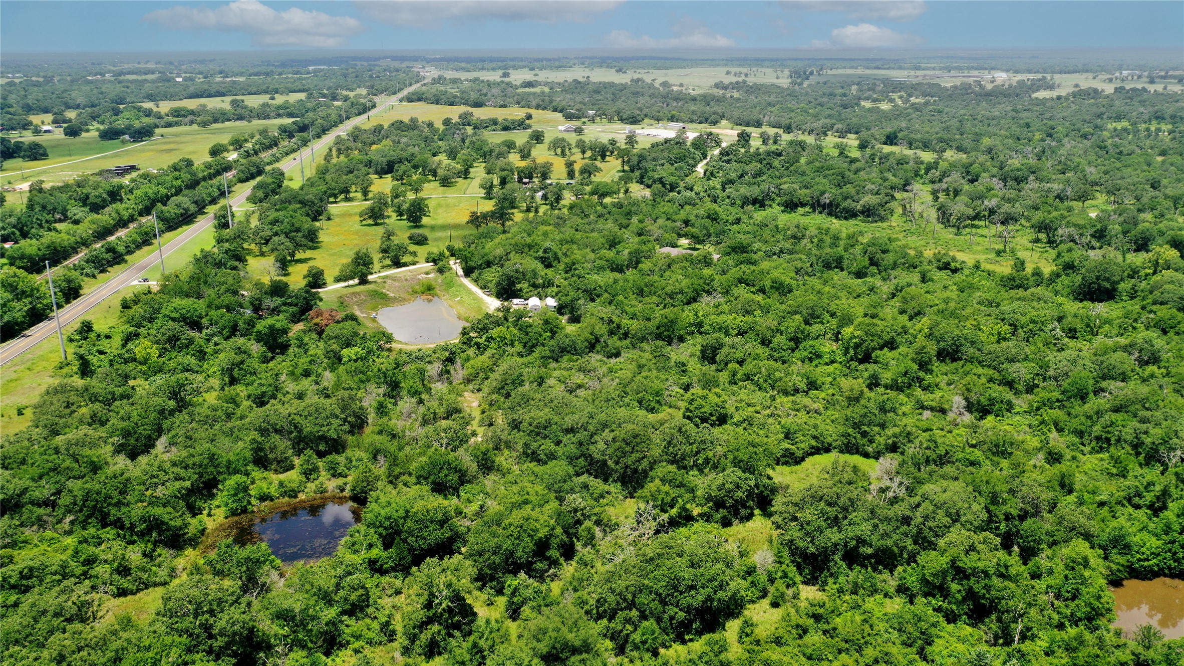 Tbd Tbd Fm-2154 Navasota, TX 77868 - Photo 8 of 27 an aerial view of a residential houses with outdoor space and trees
