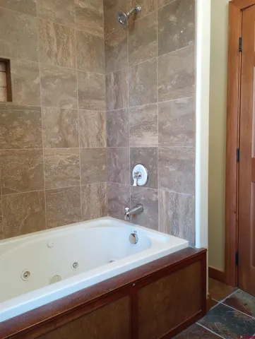 an aerial view of a houses with city view