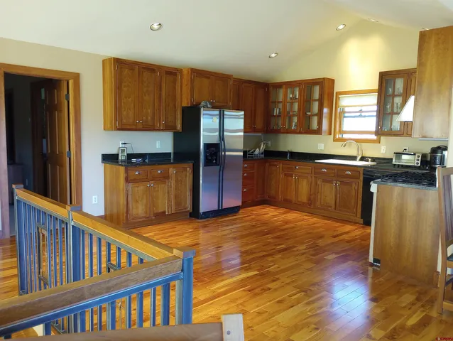 a view of staircase with a large window