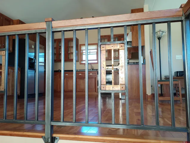 a view of a glass door with a glass windows