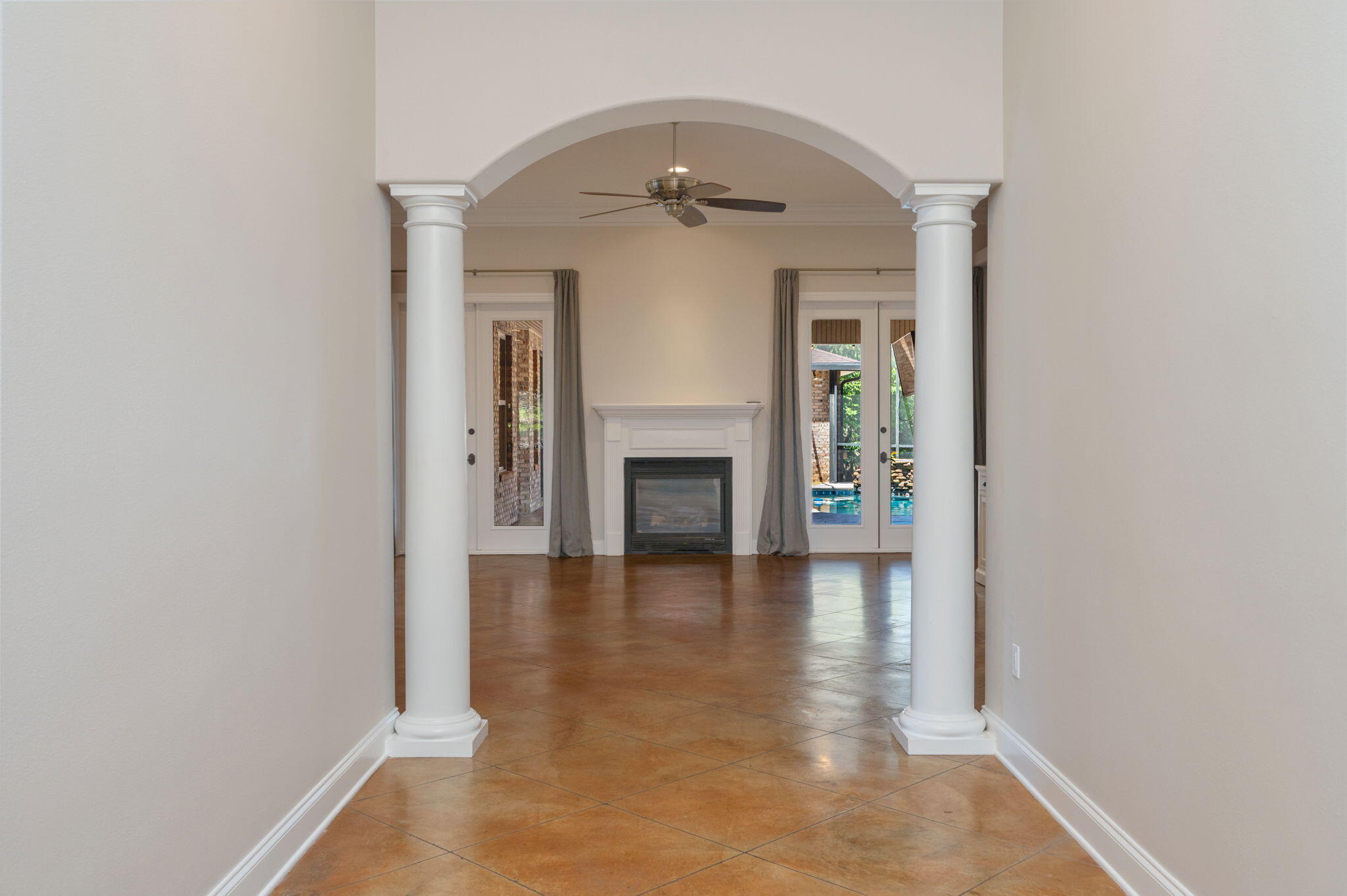14 Blenheim Road Shalimar, FL 32579 - Photo 12 of 71 a view of a hallway with wooden floor and a fire place