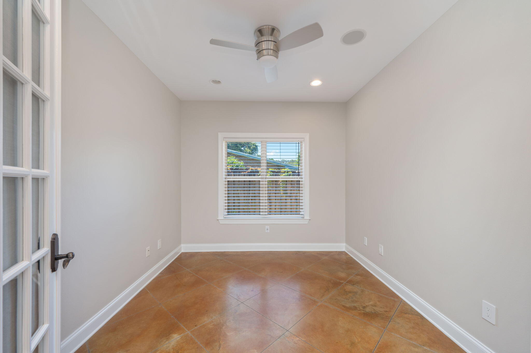 14 Blenheim Road Shalimar, FL 32579 - Photo 13 of 71 a view of a big room with windows and cabinet