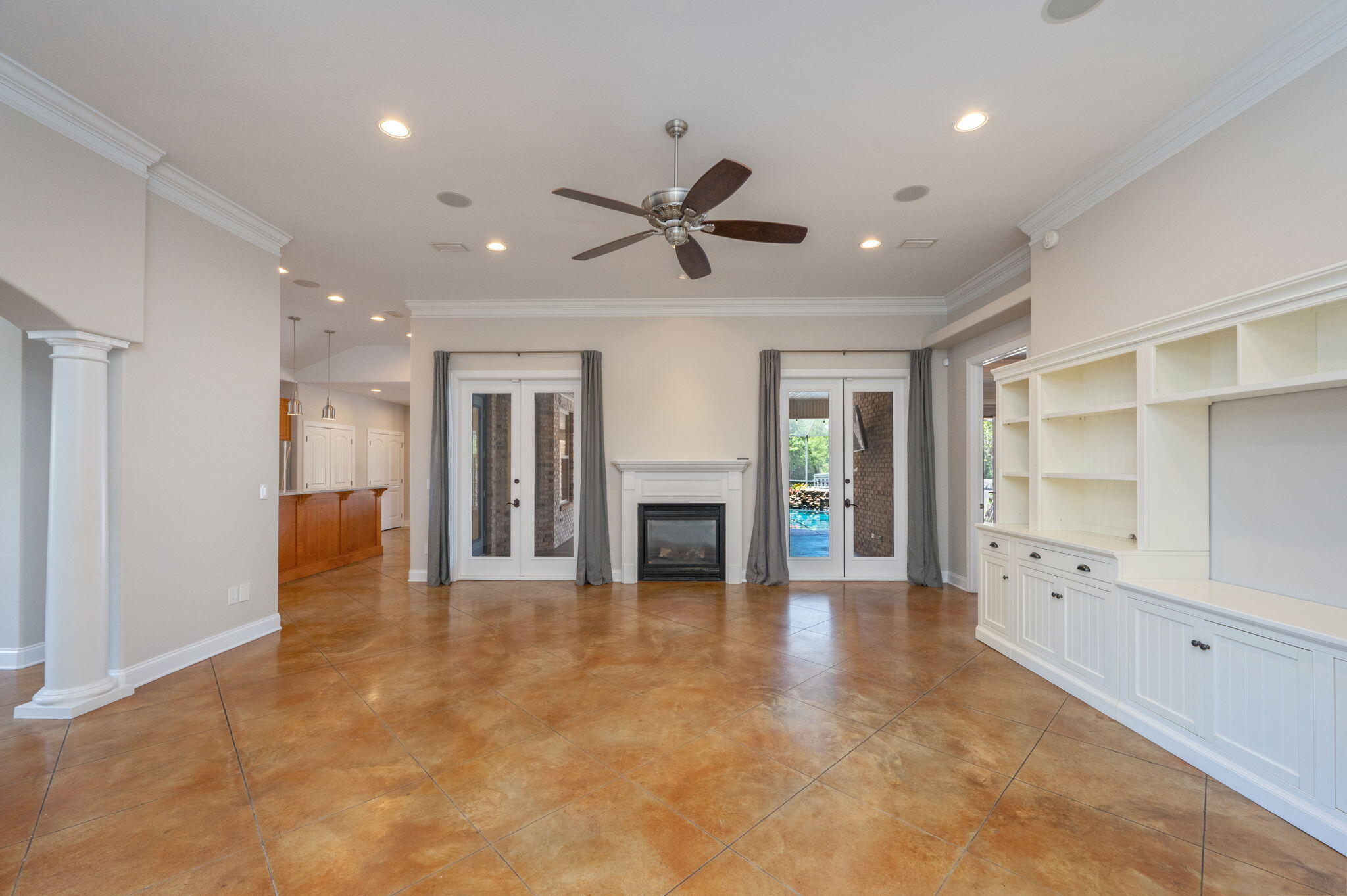 14 Blenheim Road Shalimar, FL 32579 - Photo 15 of 71 a view of a livingroom with a fireplace window and a kitchen