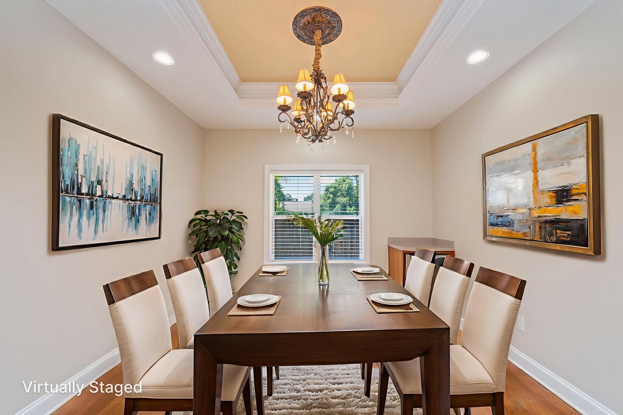 14 Blenheim Road Shalimar, FL 32579 - Photo 17 of 71 a view of a dining room with furniture a chandelier and wooden floor