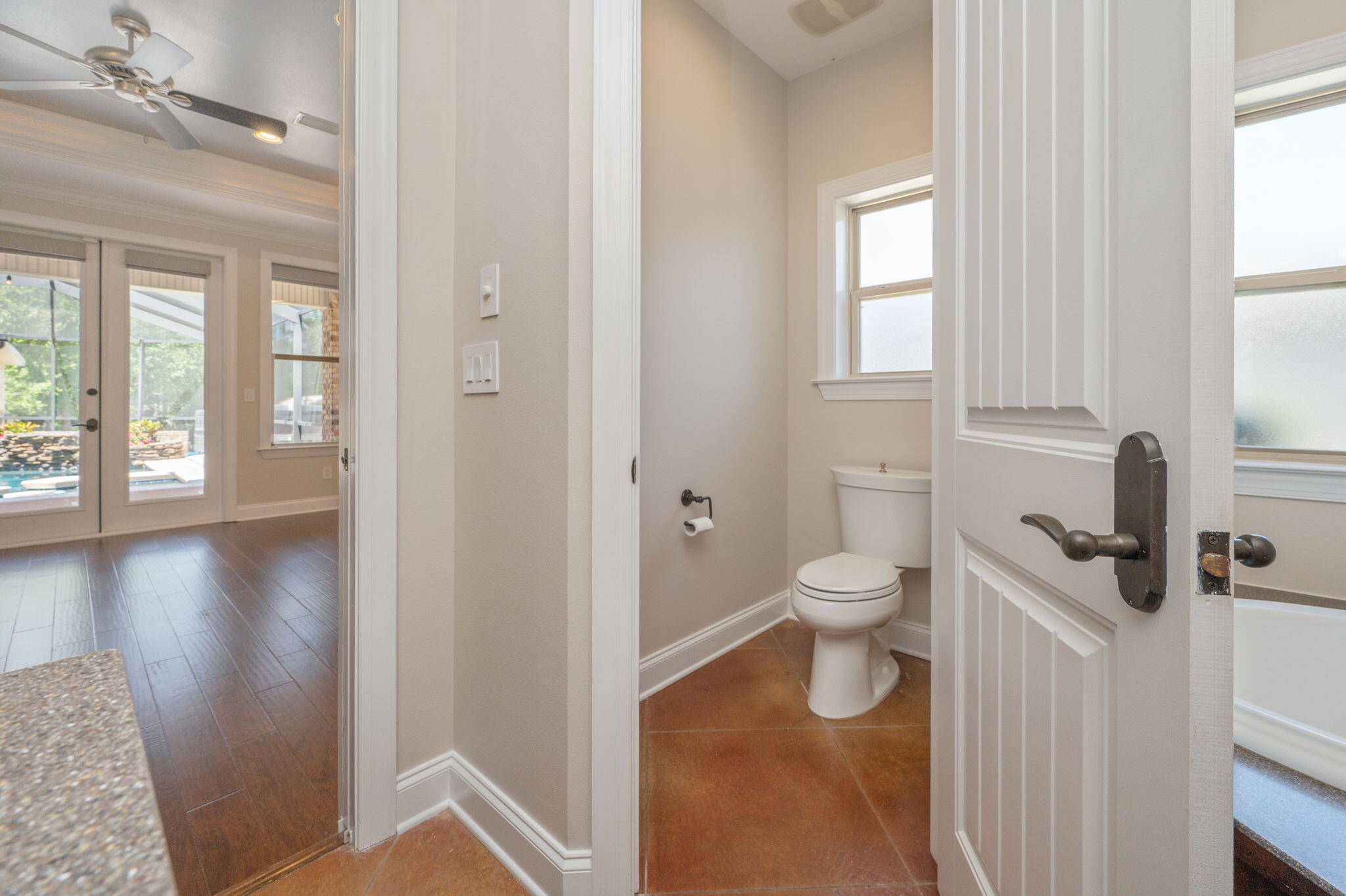 14 Blenheim Road Shalimar, FL 32579 - Photo 28 of 71 a bathroom with a toilet a sink and a window