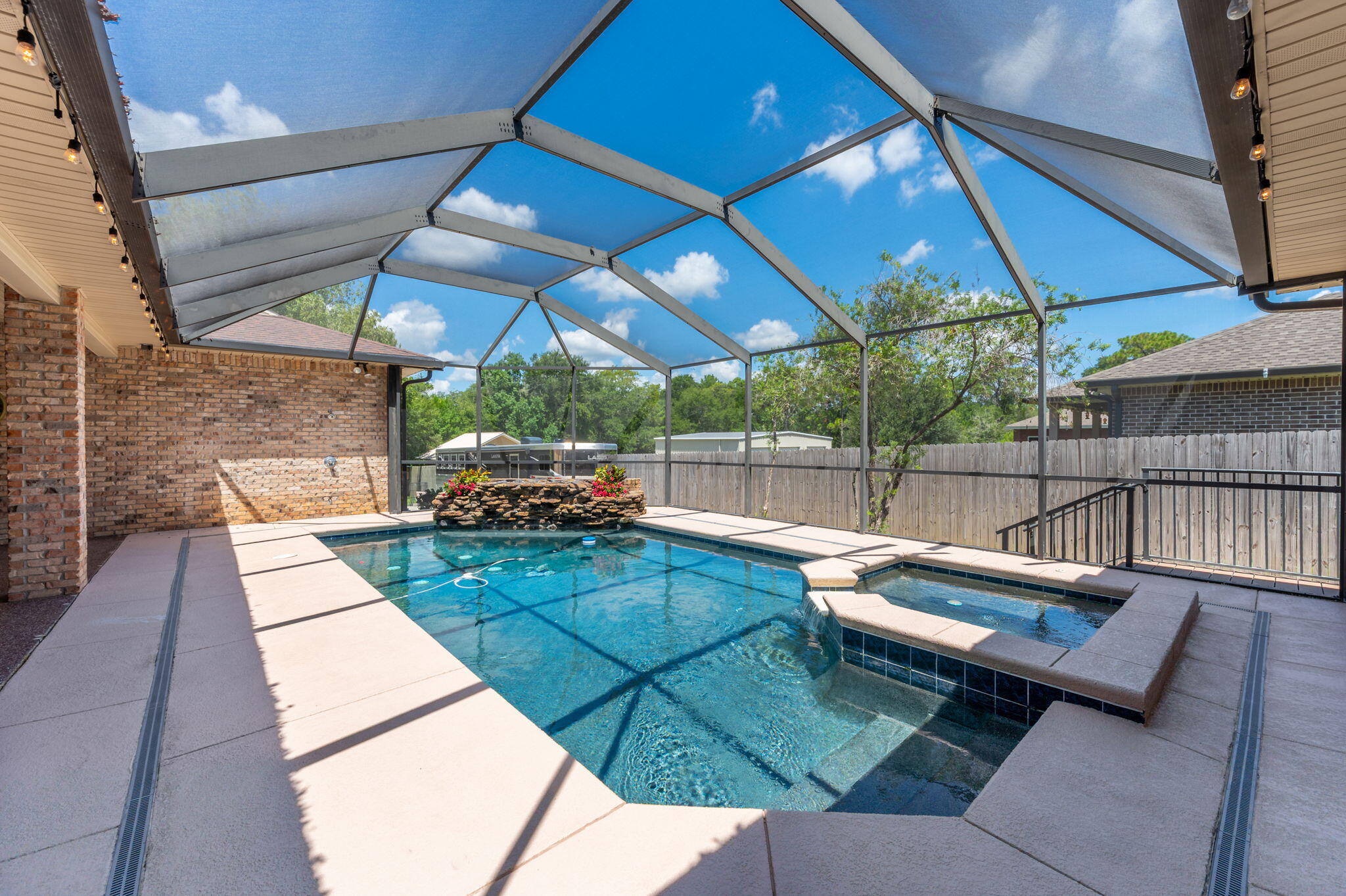 14 Blenheim Road Shalimar, FL 32579 - Photo 3 of 71 a patio with water view fountain with wooden floor