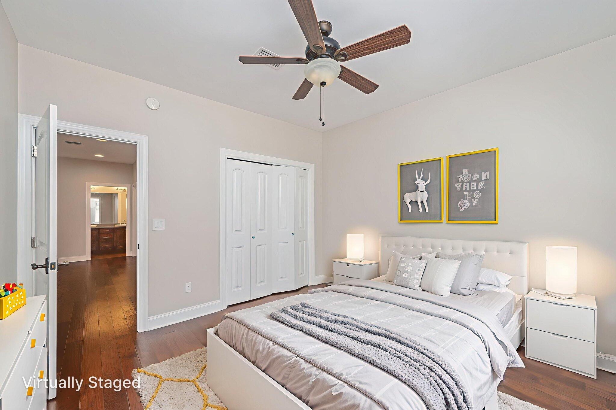 14 Blenheim Road Shalimar, FL 32579 - Photo 36 of 71 a bedroom with a bed and a chandelier